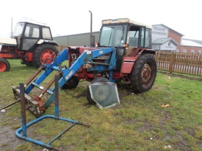 International 584 tractor and Tanco loader