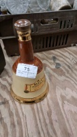 Bell shaped bottle of whiskey