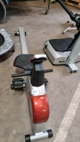 Dynamix rowing machine trainer