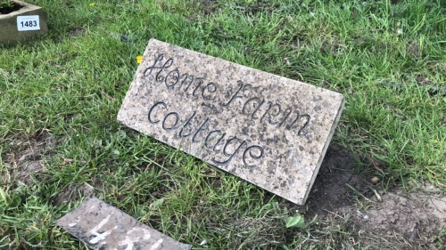 Hand carved Yorkshire stone plaque reads Hope Farm Cottage