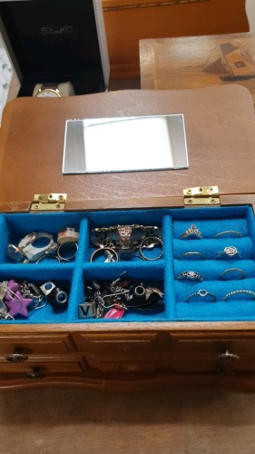 Wooden jewellery box in the form of a chest of drawers (one actual drawer) full of costume jewellery