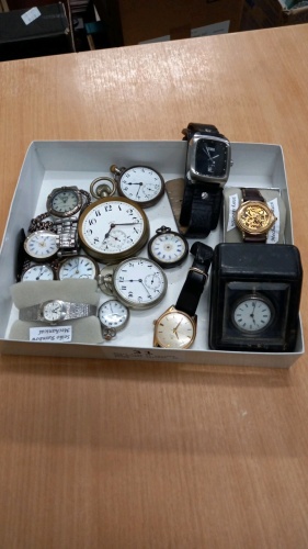 Small tray of watches and pocket watches, as found
