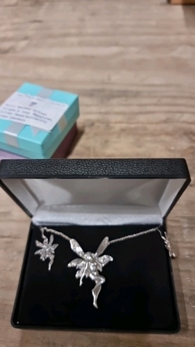 Hall marked Silver Fairy pendant with matching earrings