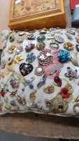 Cushion full of brooches