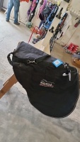 Black waterproof saddle cover with strap