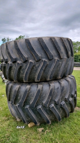 Pair of Firestone flotation wheels, 900/60/32, John Deere yellow, 10-stud centre, approx 65\% tread left, good condition