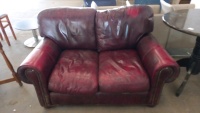 2 seat red leather settee