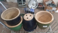 4 Ceramic planters and 1 ceramic plant saucer