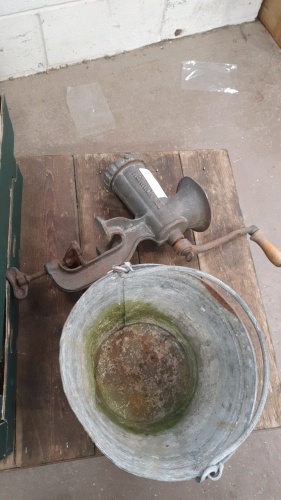 Metal bucket and large meat mincer