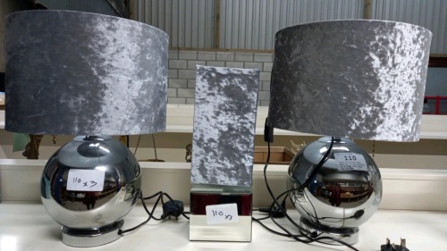 Pair of silver base lamps and another