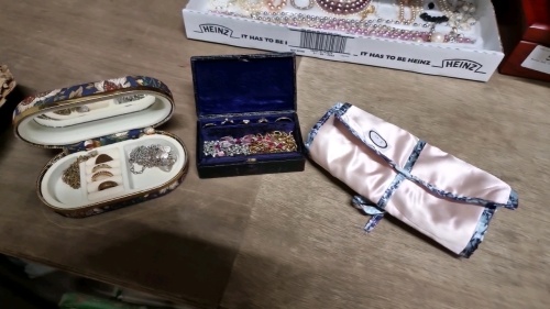 2 small jewellery boxes full of costume jewellery with a jewellery roll