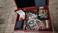 Brown box of jewellery
