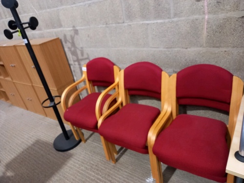 6 x red fabric office reception chairs and a coat stand