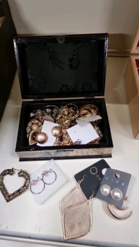 Box of assorted earrings