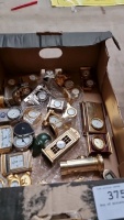 Box of miniature clocks