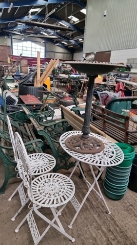 Metal patio table and chairs, bird bath