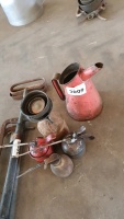 Various oil cans, funnels and jugs