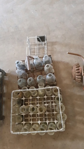 2 x old milk crates and bottles