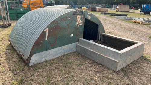Galvanised pig hut with fender
