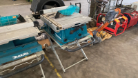 Makita 2704 table saw with mobile stand on wheels and guides, excellent condition, working