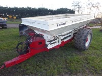 Land drive lime spreader
