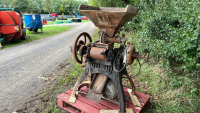 Vintage corn mill with electric motor