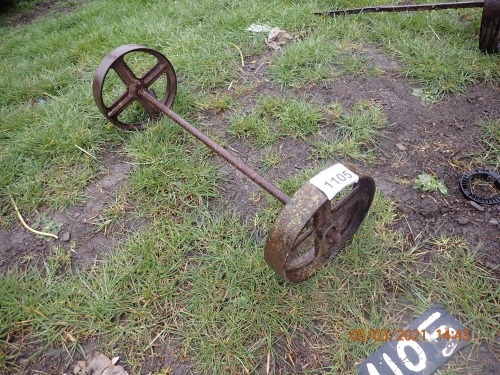 Pair of vintage cast iron wheels