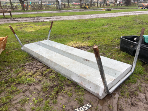 Double sided calf feed trough