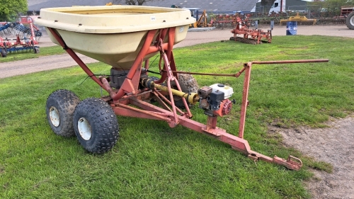 Vicon fertiliser spreader mounted on twin axle LGP chassis with Honda engine