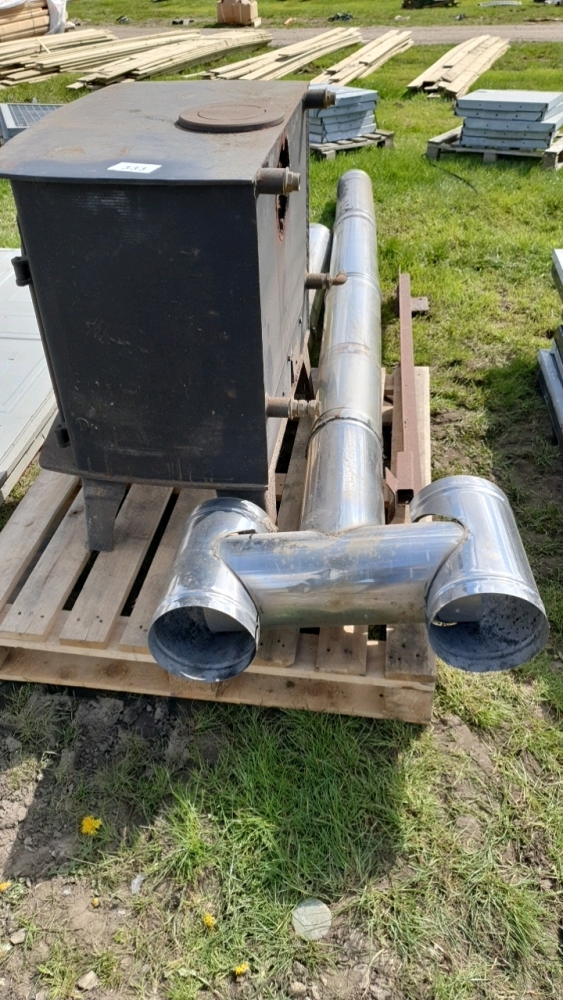 Large wood burning stove with water jacket and 4m of flue York