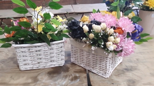 2 square baskets of flowers