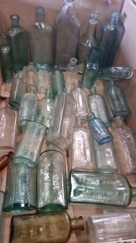 Group of vintage medicine bottles circa 1900-1930