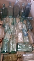 Group of vintage medicine bottles circa 1900-1930