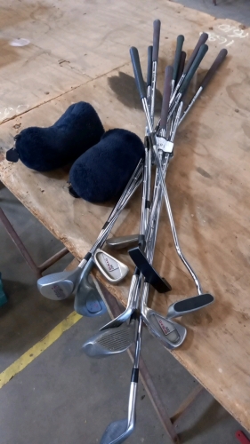 Wilson golf clubs 5 & 3 wood, Jumbo driver, 6 irons, Donnay series 6 putter, Tilteist putter and 3 wood head covers