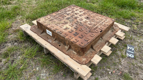 Large cast iron manhole lid