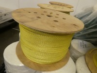 4 reels of yellow string, one part used