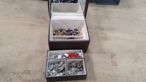 Brown jewellery box with contents of jewellery