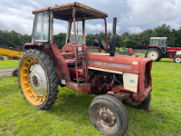 International 454 tractor, date registered 22/6/72, V5 reg no. MEP 797K, no brakes. Used for hay turning this year, runs.