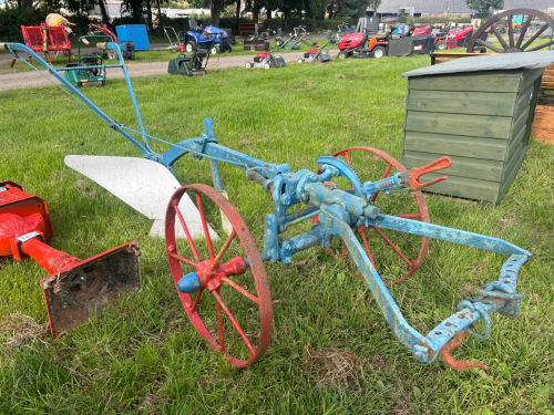 Early single furrow horse drawn plough with trip lever