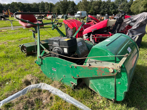 Ransome lawnmower with pull along roller seat