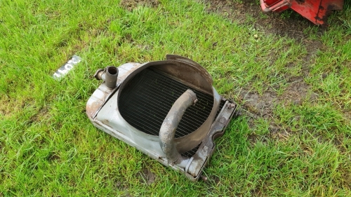 Original and genuine Massey Ferguson 135 radiator with pipes and fan shroud, no leaks