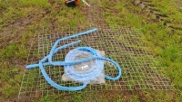 Hedge cutter mesh guard for tractor cab