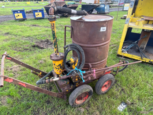 Tar sprayer on wheels, working when last used