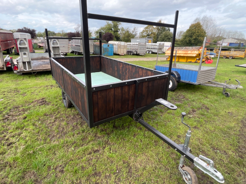8x5 car trailer, new tyres, ladder racks front and back, new tongue and groove boards on the sides, plywood floor treated with creosote, aluminium sheet over top, fresh coat of paint