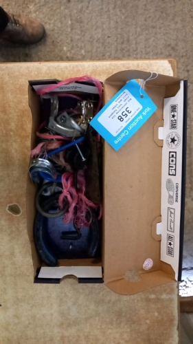 Box containing tie rings, tool hangers, bolt and other metalware