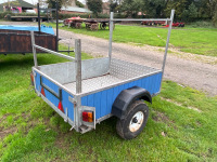 5x4 car trailer, full galvanised frame and chassis. New tyres, ladder rack front and back, tongue and groove boards on the sides covered with tin sheets. Buffalo board floor with aluminium chequer plate - 4