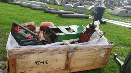 Box of farm machinery parts and tools