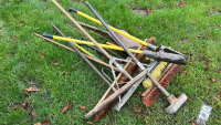 Fencing and groundwork tools, posthole digger, metal tamp, wide brush, metal forks, metal and wooden spazzels