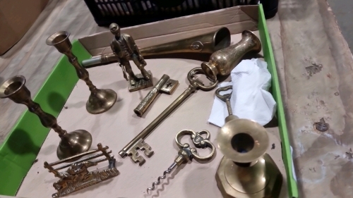 Collection of brass items, 5.25" model of a miner holding a removable pick, vintage letter rack, horse and rider, 4" long gate, vintage brass bell, bottle opener, keys, candle sticks etc