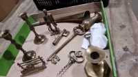 Collection of brass items, 5.25" model of a miner holding a removable pick, vintage letter rack, horse and rider, 4" long gate, vintage brass bell, bottle opener, keys, candle sticks etc